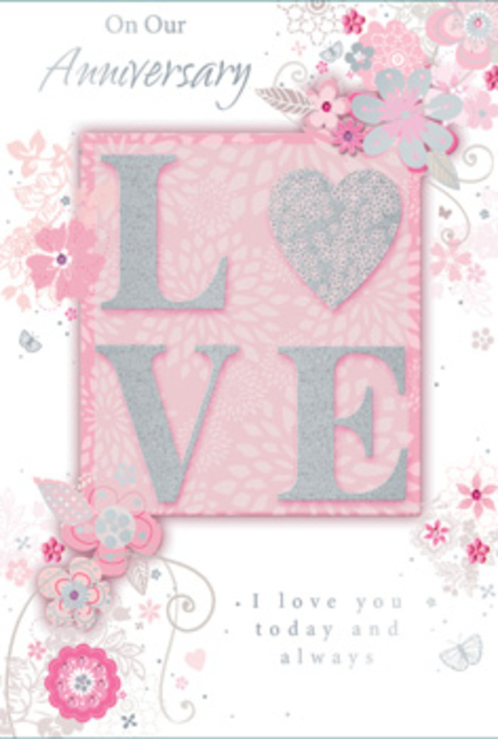This anniversary card is shown from above, its surface bathed in soft, even light that allows every delicate detail to be seen clearly, like a sunlit room in a peaceful Milton Keynes home. The central motif is the word LOVE, printed in elegant capital letters and finished with a frosted, glittery texture that seems to catch and scatter the light with every small movement. The raised effect gives the design a pleasing, tactile quality, inviting someone to gently run their fingers across each letter, much as they might trace the shape of a favourite bloom in a florist's studio near The Hub. Around this central word, wispy, hand-drawn flowers and graceful sprays drift along the borders of the card. Their colours are soft and romantic-blush pinks, lilacs, and creamy ivory tones blending together in harmony, reminiscent of a pastel bouquet arranged for an anniversary dinner in a restaurant near Campbell Park. Fine filigree lines and tiny leaves intertwine with the blossoms, and if you look closely, you can see faint, almost-hidden butterfly silhouettes, suggesting the flutter of hearts and the gentle movement of a garden in a light breeze. The message, I love you today and always, is printed in a graceful yet understated typeface, positioned so it feels like a natural extension of the floral design. Everything about the composition-its colour, spacing, and quiet elegance-evokes the feeling of a hand-tied bouquet translated into paper, a keepsake that mirrors the artistry and care of a florist preparing anniversary flowers for delivery across Milton Keynes.
